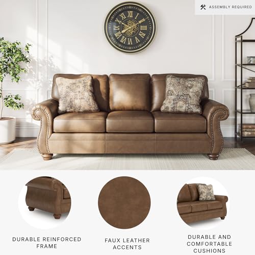 Signature Design by Ashley Shadsburne Rustic Faux Leather Sofa with Nailhead Trim and 2 Throw Pillows, Brown